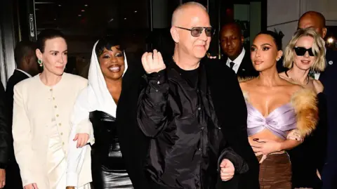 Getty Images Sarah Paulson, Niecy Nash, Kim Kardashian and Naomi Watts pictured with Ryan Murphy.